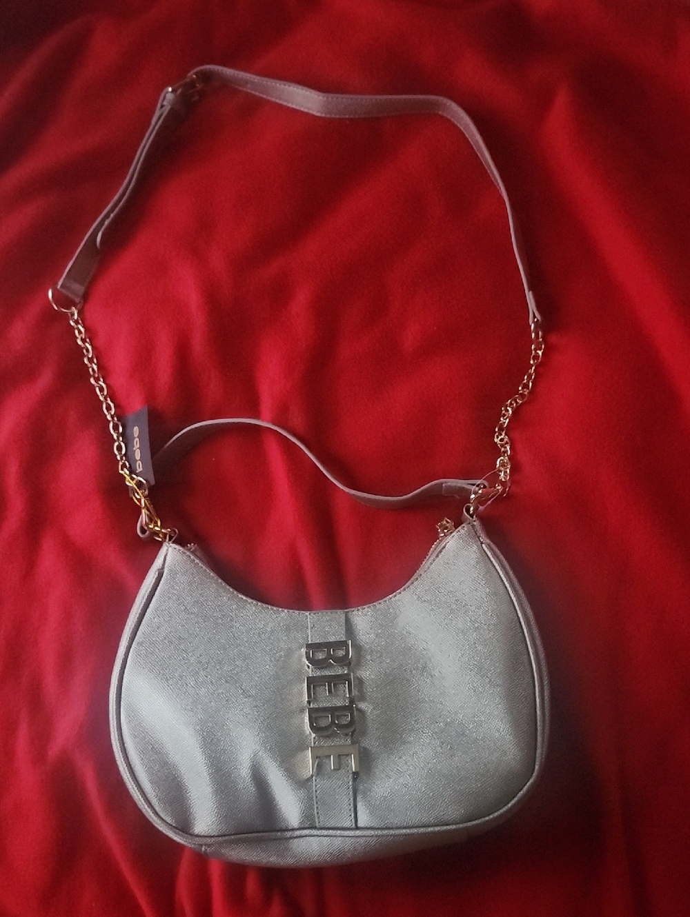 bebe Silver Metallic Crescent Shoulder Bag with Gold Chain